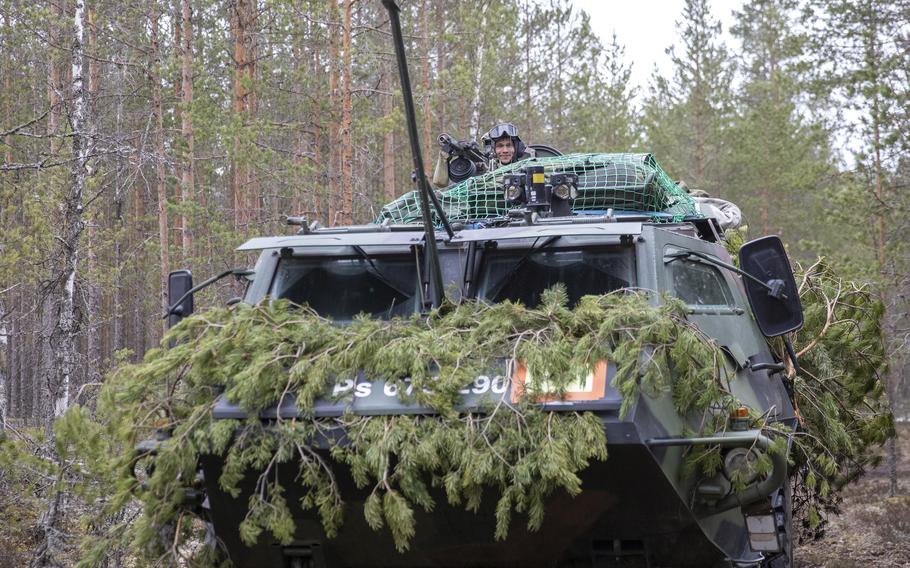 A Finnish soldier takes a break from simulated combat during the multinational Exercise Arrow 22 at Niinisalo Training Area, Finland, on May 5, 2022. Finland announced on May 12, 2022, that it intends to join NATO. 