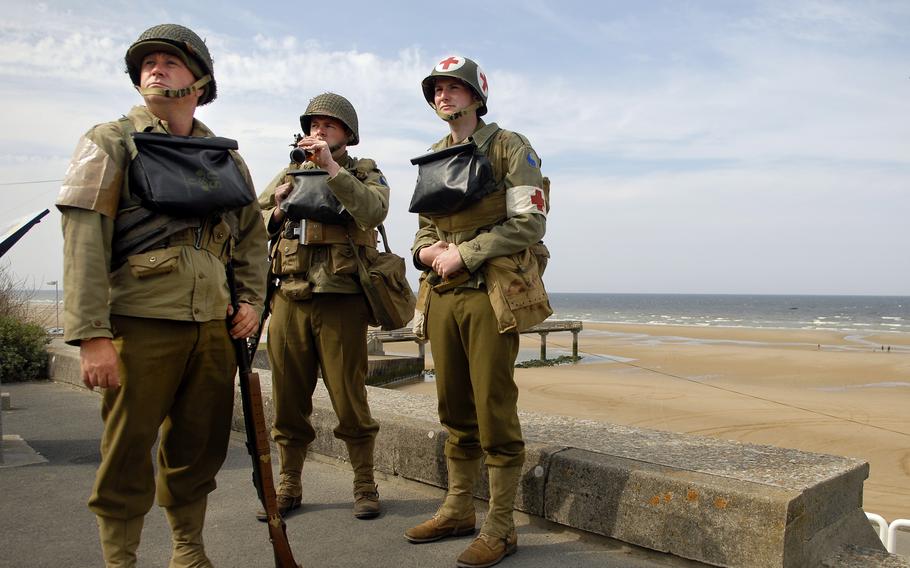 Re-enactors from southern England wait for a ceremony to begin near Omaha Beach June 4, 2009 in Normandy, France.