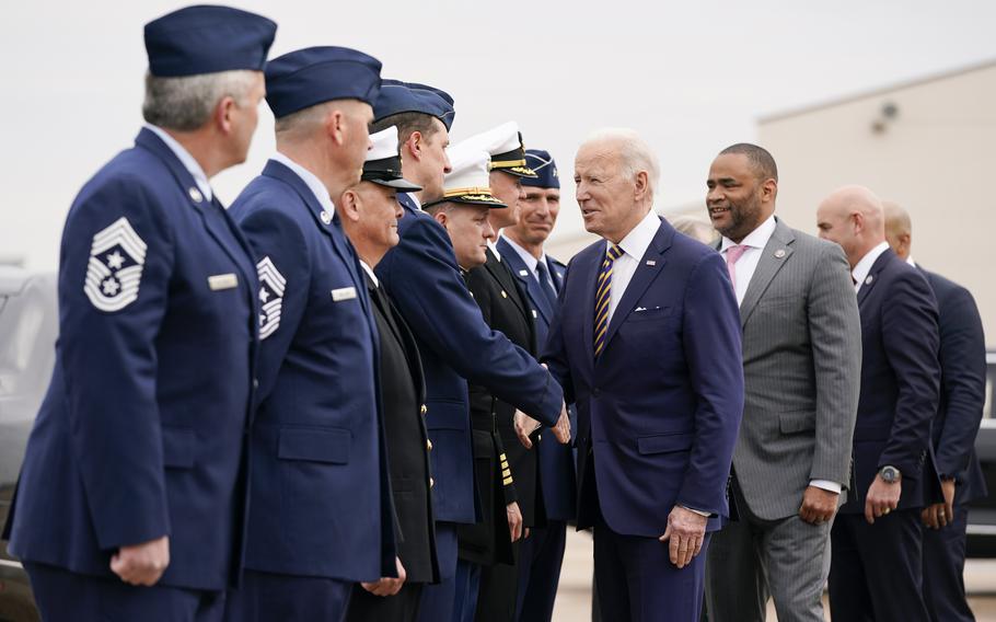President Joe Biden speaks with greeters after stepping off Air Force One at Naval Air Station Joint Reserve Base, Tuesday, March 8, 2022, in Fort Worth, Texas. Biden was in Fort Worth to address access to health care and benefits for veterans affected by military environmental exposures.
