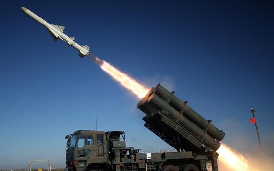 Japan Ground Self-Defense Force soldiers fire a Type-88 missile in this undated photo.