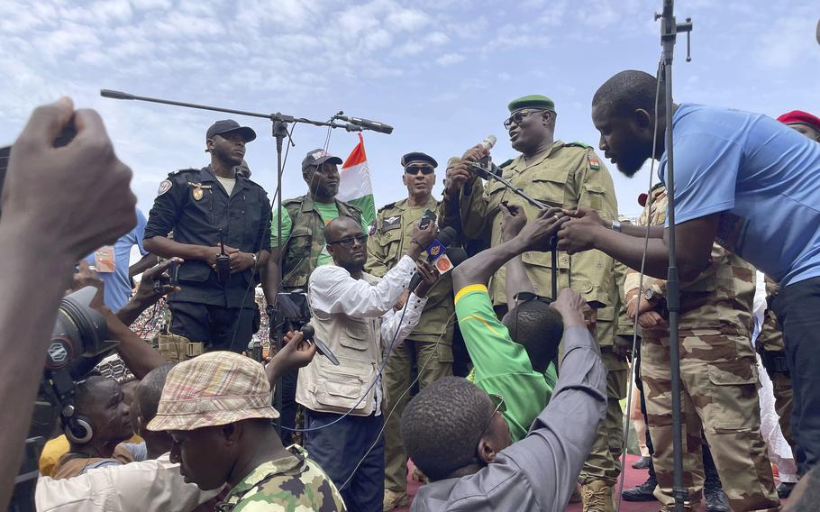 Mohamed Toumba, one of the soldiers who ousted Nigerian President Mohamed Bazoum, addresses supporters of Niger's ruling junta in Niamey, Niger, Sunday, Aug. 6, 2023. 