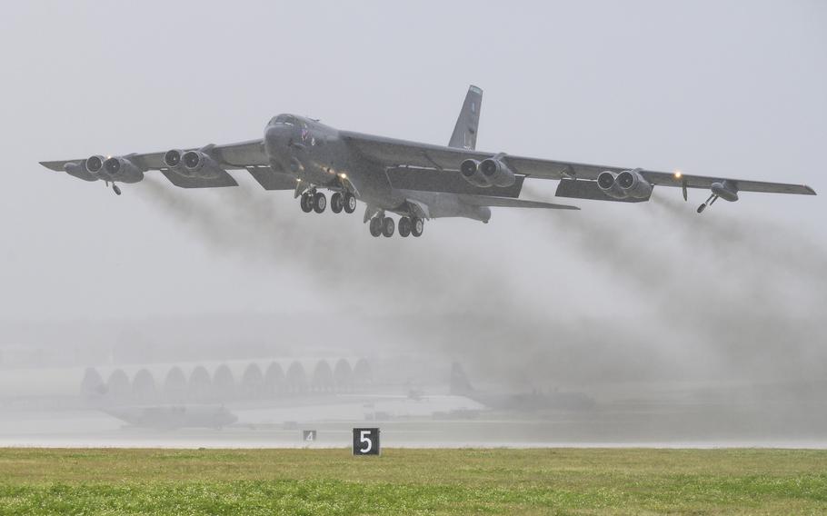 A U.S. Air Force B-52 Stratofortress takes off from Andersen Air Force Base in Guam in 2021. Militaries around the world produce about 5.5% of global greenhouse gas emissions, according to new data published Thursday, Nov. 10, 2022. 