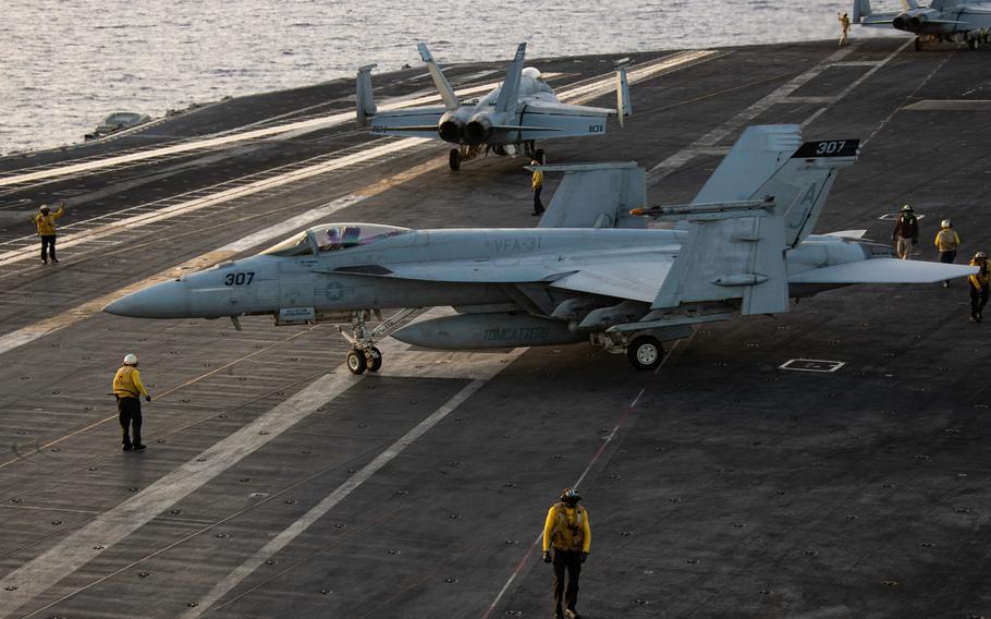 F/A-18 Super Hornets taxi the flight deck on the USS Gerald R. Ford in the Mediterranean Sea on Nov. 6.