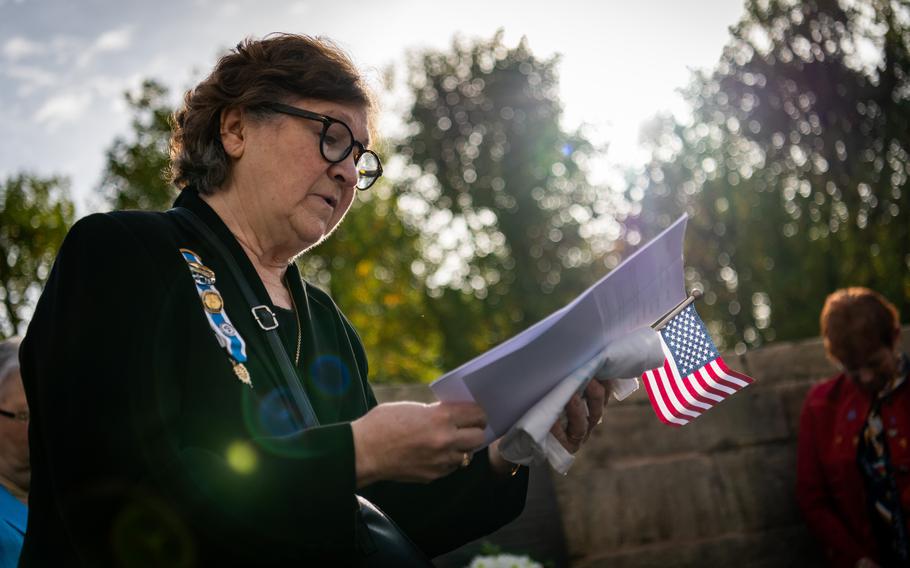 Shirley Herzer, a member of the Daughters of the American Revolution Palatinate Chapter, delivers a prayer at a ceremony in Zweibrucken, Germany, Saturday, Oct. 29, 2022, during which a plaque was unveiled to honor the local Regiment Royal Deux-Ponts that supported American colonists at the Battle of Yorktown.
