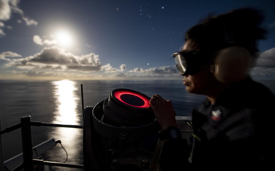 Petty Officer 2nd Class Edmond Nazareno checks a gyro repeater compass while standing watch aboard the amphibious assault ship USS Kearsarge in the Atlantic Ocean in 2018.  A recent U.S. Government Accountability Office report says despite a 2017 Navy policy aimed at managing fatigue, the Navy has inconsistently implemented the policy and sailors still are not getting adequate sleep.