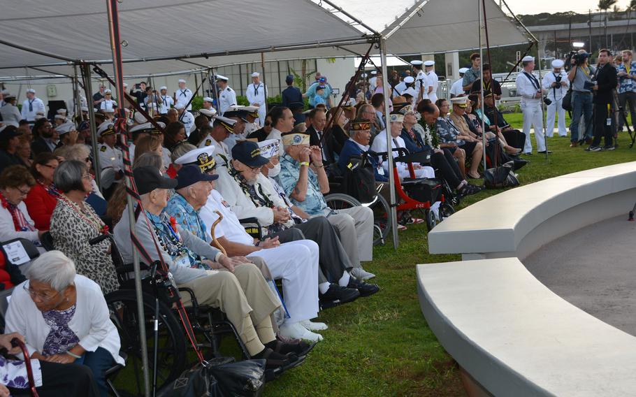 Nine survivors of the 1941 attack on Pearl Harbor sit in the front row for the commemoration of the event at the Pearl Harbor National Memorial in Hawaii, Dec. 7, 2022.