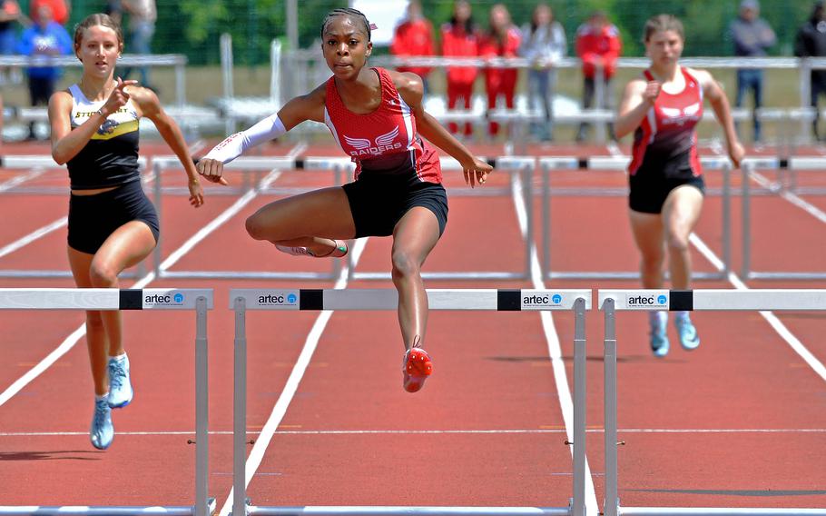 Kaiserslautern’s Lellah Guhn clears the final hurdle on the way to winning the girls 300-meter hurdle event in 45.22 seconds, at the 2025 DODEA-Europe track and field finals in Kaiserslautern, Germany, 
