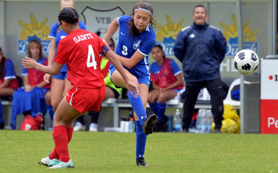 Rota’s Jourdan Timmons takes a shot on goal against Aviano’s Lily Coral-Galvan in a Division II game at the DODEA-Europe soccer finals at Reichenbach-Steegen, Germany, May 21, 2024. Rota beat Aviano 4-0.