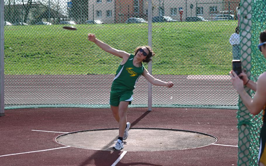 Daniel D’Alessandro, a freshman, tosses the discus during the Ansbach Invitational track meet at Ansbach Middle High School, Germany, on Saturday, April 6, 2024. 