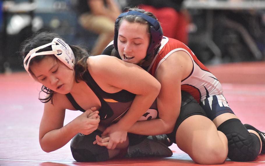 Aviano’s Paige Rogers has control of Vicenza’s Ivy Anderson in a 120-pound match Saturday, Feb. 4, 2023, at the DODEA-Europe Southern Europe regional at Aviano Air Base, Italy. Anderson went on to win the match.