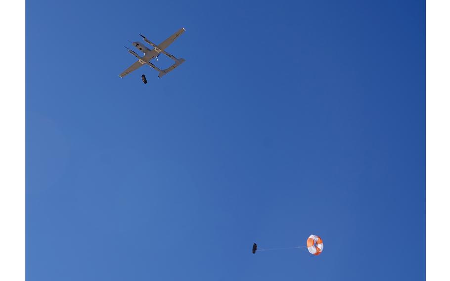 A U.S. Army aerial drone delivers a payload of medical supplies during the exercise Project Convergence 22 at Fort Irwin, Calif., Oct. 28, 2022. The drop was part of Army efforts to find aerial drones that can deliver medical supplies, such as blood, to wounded troops as fast as possible. 