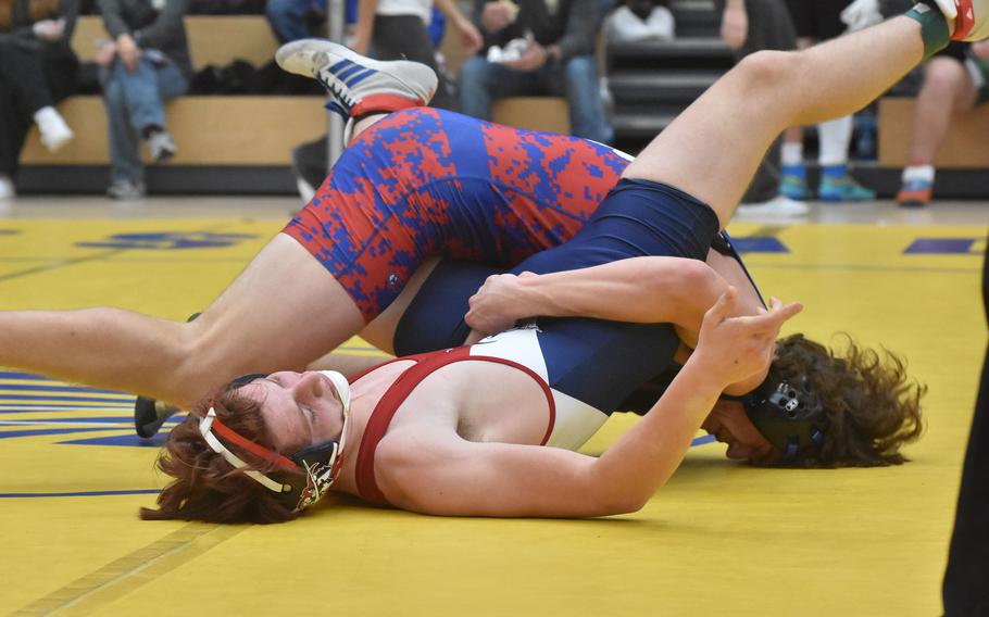 Ramstein’s Lucas Hollenbeck and Lakenheath’s Wesson Roney are going in different directions in a 165-pound match Friday, Feb. 9, 2024, at the DODEA European Wrestling Championships in Wiesbaden, Germany. Hollenbeck won the match.