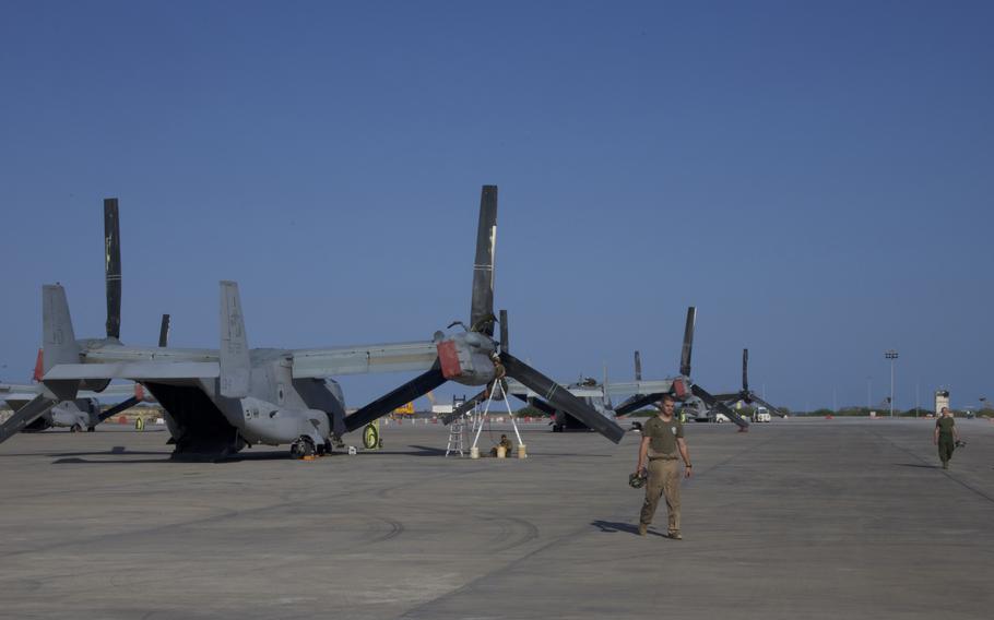 Crews with Marine Medium Tiltrotor Squadron 161 at Camp Lemonnier, Djibouti, perform maintenance on MV-22 Ospreys that are part of a new rotational deployment, Oct. 27, 2021, at the U.S. military’s only permanent base in Africa. Crews were put on alert during an unfolding coup about 750 miles away in Sudan.