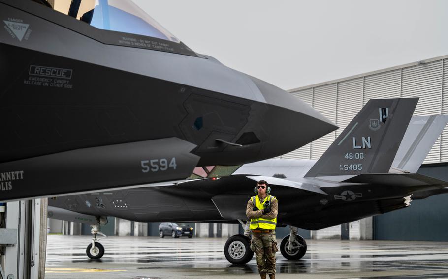 Airman Robbie Lettieri of the 493rd Fighter Squadron helps a U.S. Air Force F-35A Lightning II onto the taxiway May 29, 2023, for the kickoff of Arctic Challenge at Orland Air Base in Norway.