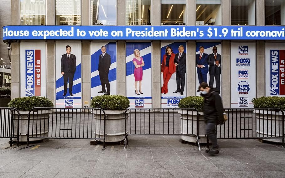 The exterior of Fox News’s headquarters in Manhattan includes images of the media corporation’s prominent broadcast personalities. Fox News is in a defamation lawsuit filed by Dominion Voting Systems.