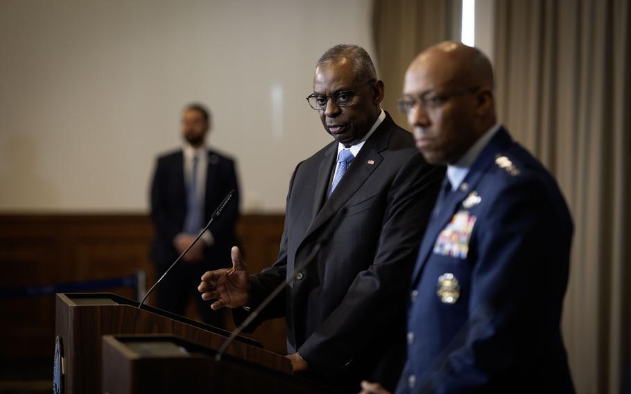Defense Secretary Lloyd Austin, left, and Gen. Charles G. Brown Jr., chairman of the joint chiefs of staff, address reporters during the Ukraine Defense Contact Group meeting at Ramstein Air Base, Germany, Tuesday, March 19, 2024. A new military aid package from the United States worth $300 million will support Ukraine’s pressing needs for air defense, artillery and anti-tank capabilities, Austin said.