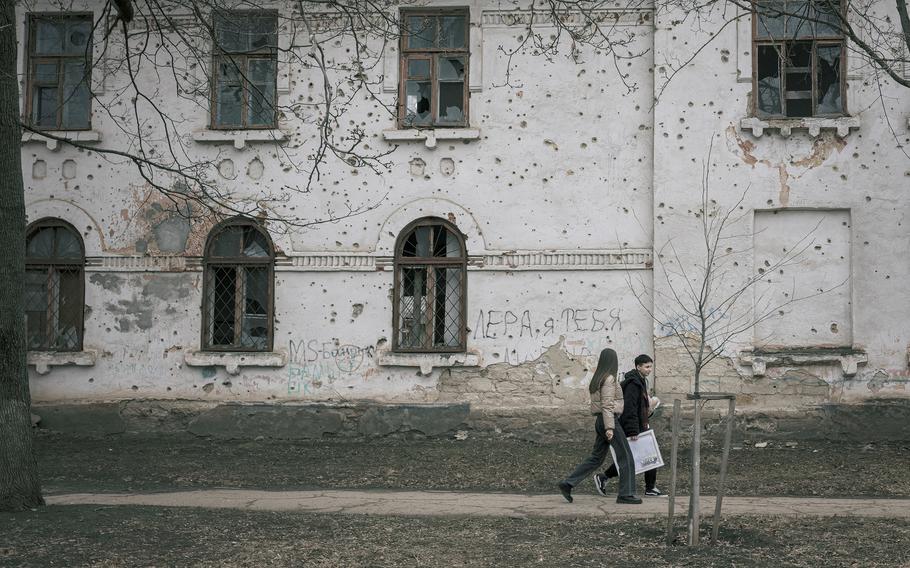 Reminders of the early 1990s conflict remain in the city, including this building marked by artillery fire, in Bender, Transnistria, on March 6, 2022.