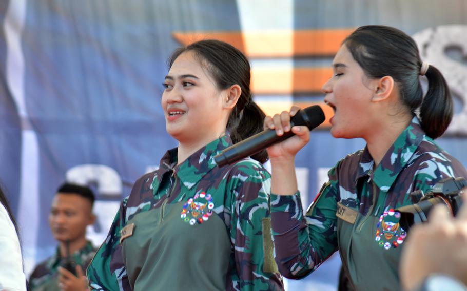 A pop band that included Indonesian soldiers performs for an enthusiastic crowd at Baturaja Training Area, Indonesia, Saturday, Aug. 13, 2022. 