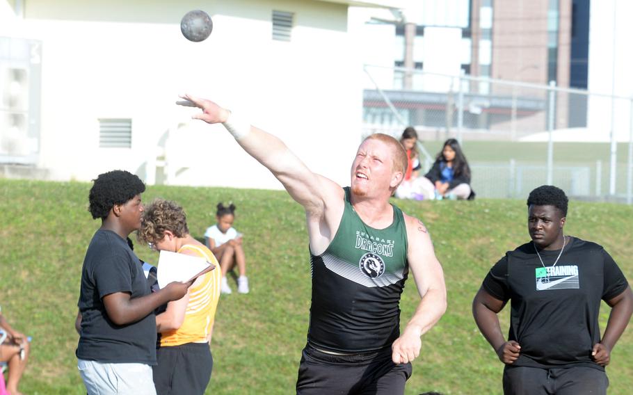 Brennen Hall throws the shot.