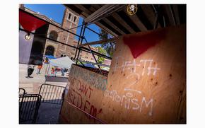 Graffiti at the Powell Library on the UCLA campus where pro-Palestinian demonstrators erected an encampment on April 29, 2024, in Los Angeles. (Brian van der Brug/Los Angeles Times/TNS)