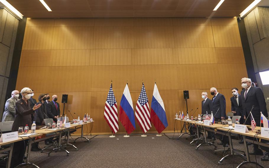 US Deputy Secretary of State Wendy Sherman, left, and Russian deputy Foreign Minister Sergei Ryabkov, right, attend security talks at the United States Mission at the United States Mission in Geneva, Switzerland, Monday, Jan. 10, 2022. 