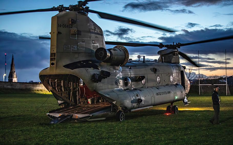 An Army Chinook prepares to transport President Joe Biden’s staff during his visit to Ireland on Friday, April 14, 2023. 