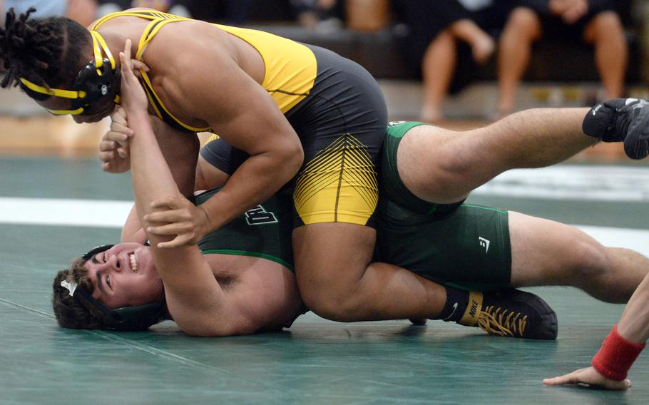 Kadena 215-pounder Jeremiah Drummer gets Kubasaki's Evan Swan on his back during Wednesday's Okinawa wrestling dual meet. Drummer pinned Swan in 1 minute, 11 seconds and the Panthers won the meet 35-26 to go 2-0 on the season.