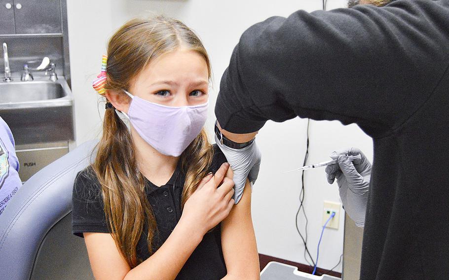 Sianna Gautier, then-8, prepares herself to receive the Pfizer-BioNTech pediatric COVID-19 vaccine at Bayne-Jones Army Community Hospital at Fort Polk, La., Nov. 9. 2021.