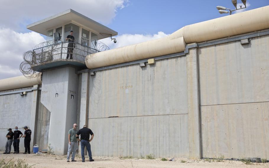 Police officers and prison guards inspect the scene of a prison escape outside the Gilboa prison in northern Israel, Monday, Sept. 6, 2021. Israeli forces on Monday launched a massive manhunt in northern Israel and the occupied West Bank after several Palestinian prisoners escaped overnight from the high-security facility in an extremely rare breakout.