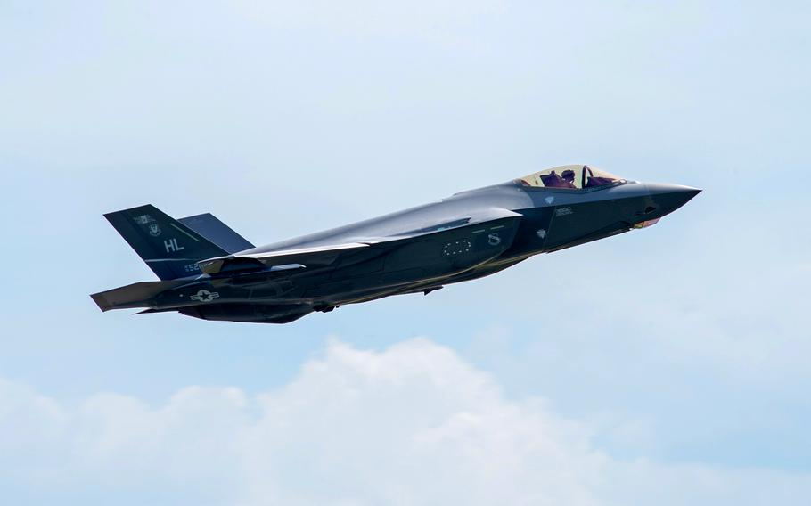 An F-35 Lightning II aircraft flies away from Spangdahlem Air Base, Germany, in 2019. The costs of the F-35 program are unsustainable, the Government Accountability Office said in a recent report.