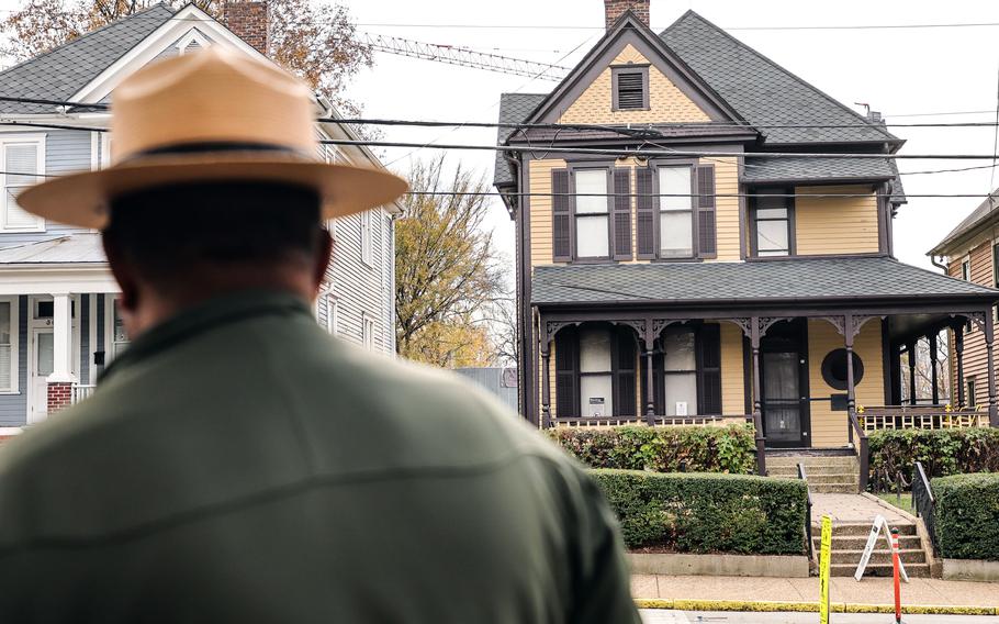 Marty Smith, chief interpreter for National Park Service, looks at the birth home of Martin Luther King Jr. from across the street on Friday, Dec. 8, 2023. A woman was arrested Thursday night after she attempted to set fire to the house.
