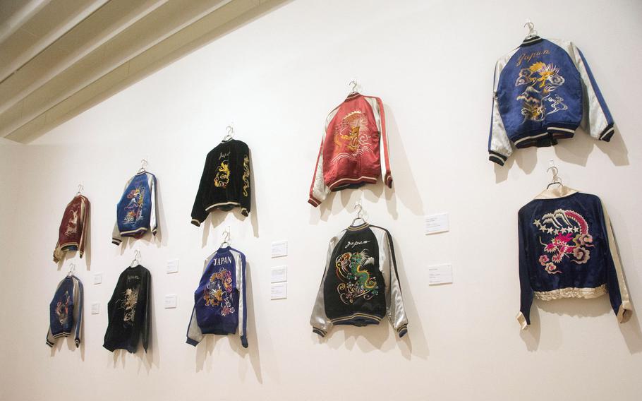 Draped carefully along the walls of the Yokosuka Museum of Art this month are scores of souvenir jackets called “sukajan” that range from vintage 1950s apparel to modern designer fashion.