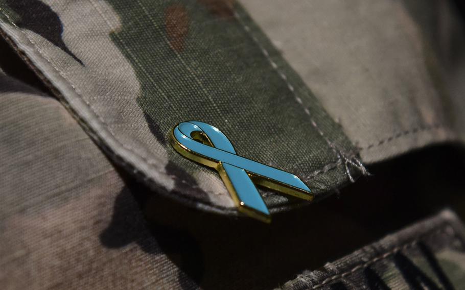 A Sexual Harassment/Assault Response and Prevention Program pin is worn by a service member at Joint Base Langley-Eustis, Va., in 2018. 