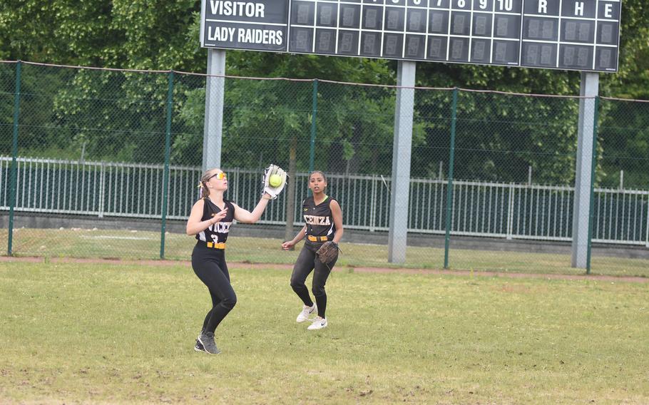 Vicenza left fielder Peyton Atkinson snags a fly ball Friday, May 23, 2025, at the DODEA-Europe Division II/III softball championshps at Kaierslautern, Germany.