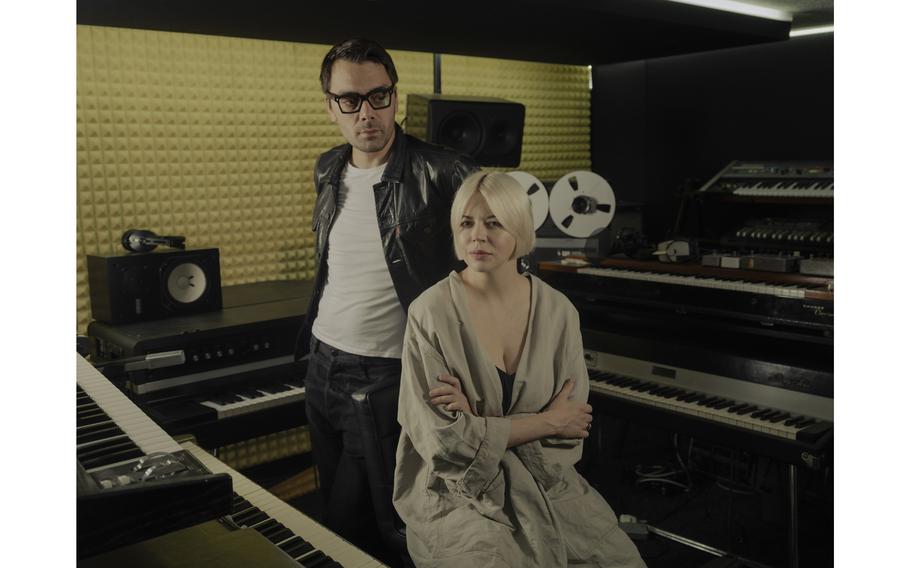 Yevhen Filatov and Nata Zhyzhchenko, who created the electro-folk group Onuka, in their recording studio in Kyiv on July 13, 2023. 