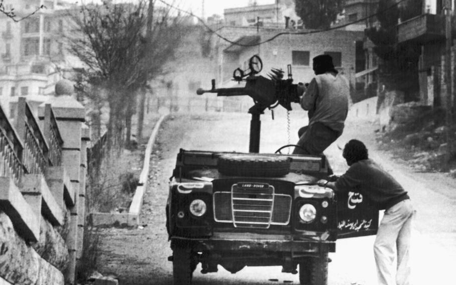 Guerilla fighters and a truck.