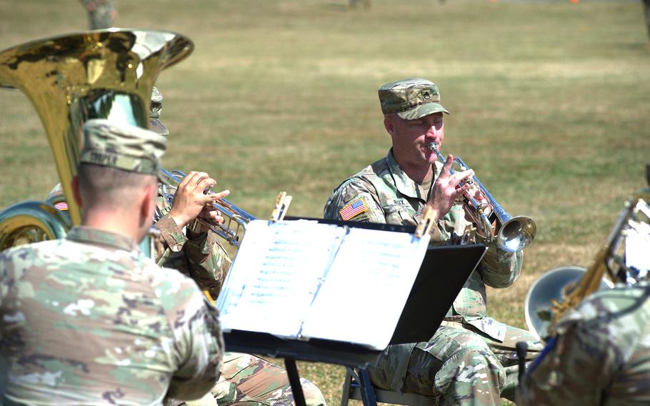 A trumpet player as part of the band.