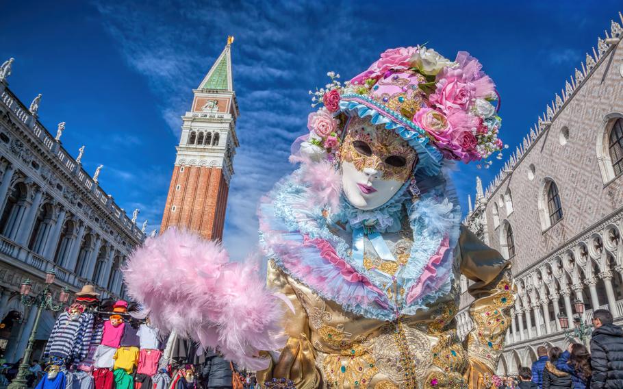 Revelers in brightly colored Venetian costumes pose on St. Mark’s Square during the Venice Carnival days. Kaiserslautern Outdoor Recreation plans a trip to Venice Feb. 16-20.