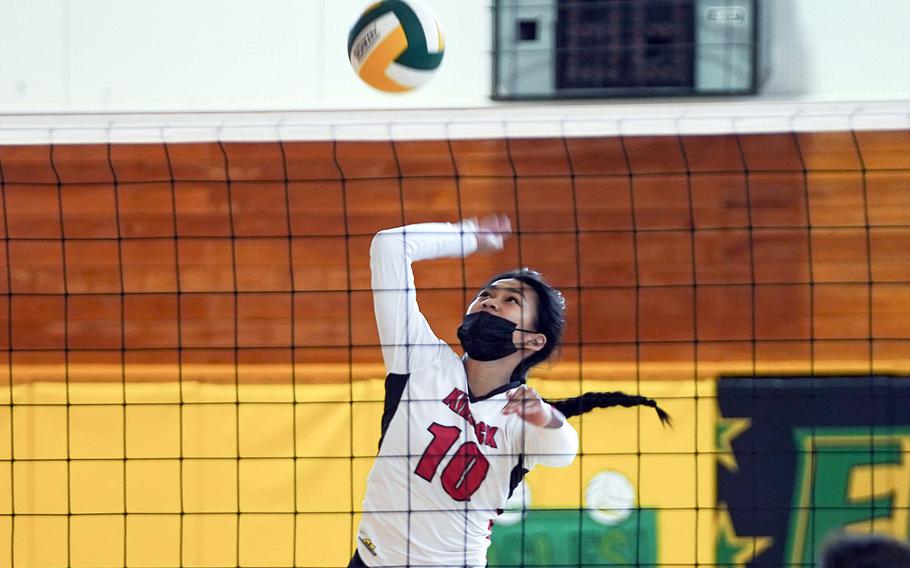 Nile C. Kinnick's Makaila Miranda spikes against Robert D. Edgren during Saturday's Japan volleyball match. The Eagles won in straight sets.