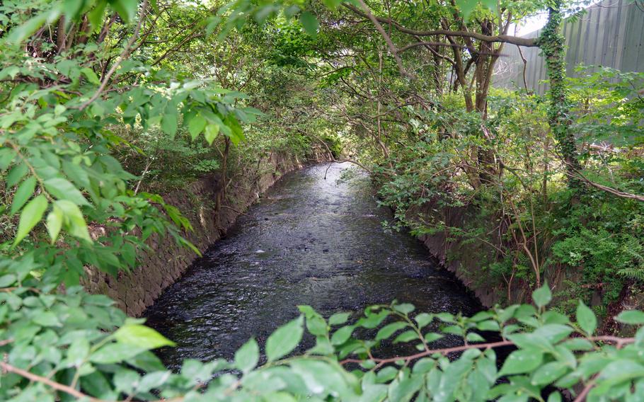 The Tate River flows near Naval Air Facility Atsugi, Japan, Friday, May 26, 2023.