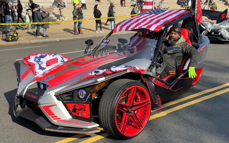 A custom vehicle takes part in the National Veterans Day Parade on Sunday, Nov. 12, 2023, in Washington. 