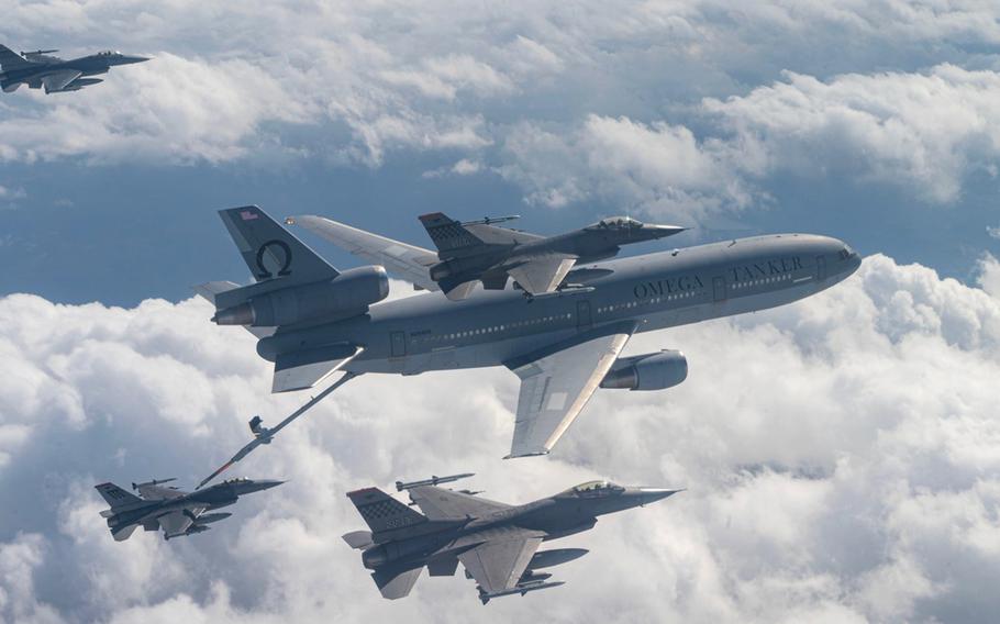 A commercial KDC‐10 tanker refuels an Air Force F‐16 Fighting Falcon from the 51st Fighter Wing on the way to Paya Lebar Air Base, Singapore, on Nov. 6.