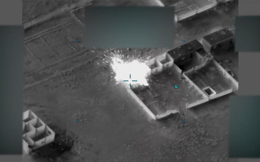 A still image from video released by the U.S.-led coalition shows an artillery strike Jan. 4, 2022, in northeastern Syria near a base known as the Green Village, which is used by coalition and Syrian partner forces.