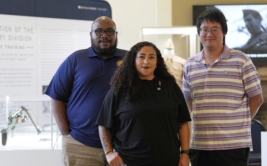 Director of Exhibitions Cale Carter II, Director of Education Dr. Michelle Tovar, and archivist Jason Fung pose for a photo inside the Buffalo Soldiers National Museum on Friday, June 27, 2025, in Houston, Texas.