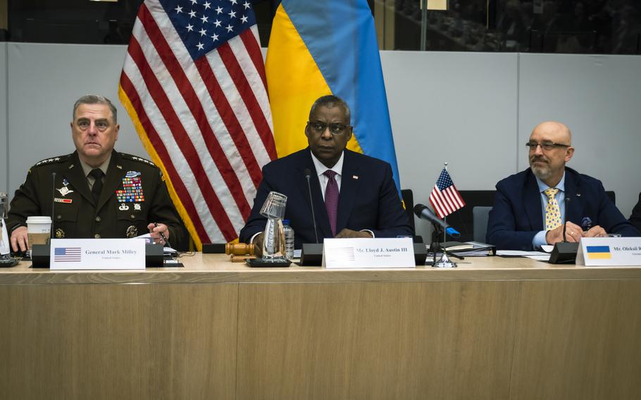 From left, U.S. Chairman of the Joint Chiefs of Staff Gen. Mark Milley, U.S. Defense Secretary Lloyd Austin and Ukraine’s Defense Minister Oleksii Reznikov attend the Ukraine Defense Contact group meeting ahead of a NATO defense ministers’ meeting at NATO headquarters in Brussels, Wednesday, June 15, 2022.