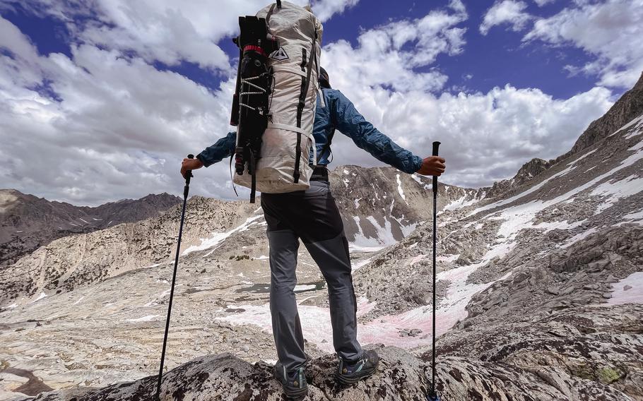 After an arduous scramble up to 60 Lakes Col, Emanuel Röhss plots the best way to hike down the other side.  Even in the best conditions, hiking in the High Sierra is not easy.