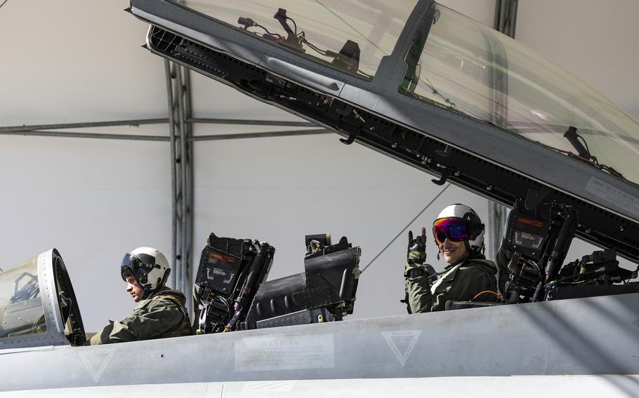 Members of Marine Fighter Attack Squadron 232 prepare to disembark an F/A-18D after landing at Marine Corps Air Station Iwakuni, Japan, Sept. 24, 2023. 