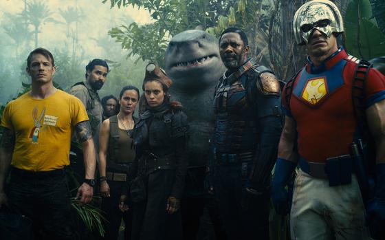 Left to right: Joel Kinnaman as Colonel Rich Flag, Alice Braga as Sol Soria, Daniela Melchior as Ratcatcher 2, King Shark, Idris Elba as Bloodsport and John Cena as Peacemaker in Warner Bros. Pictures’ superhero action adventure “The Suicide Squad.”