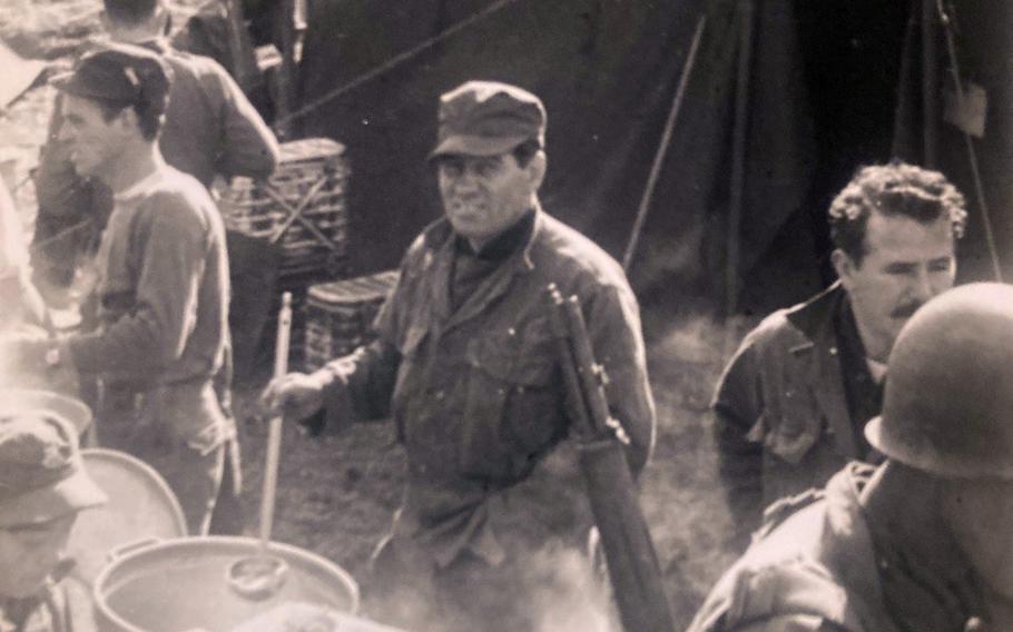 American soldiers serve chow at a camp in Korea in this undated image from the war. 