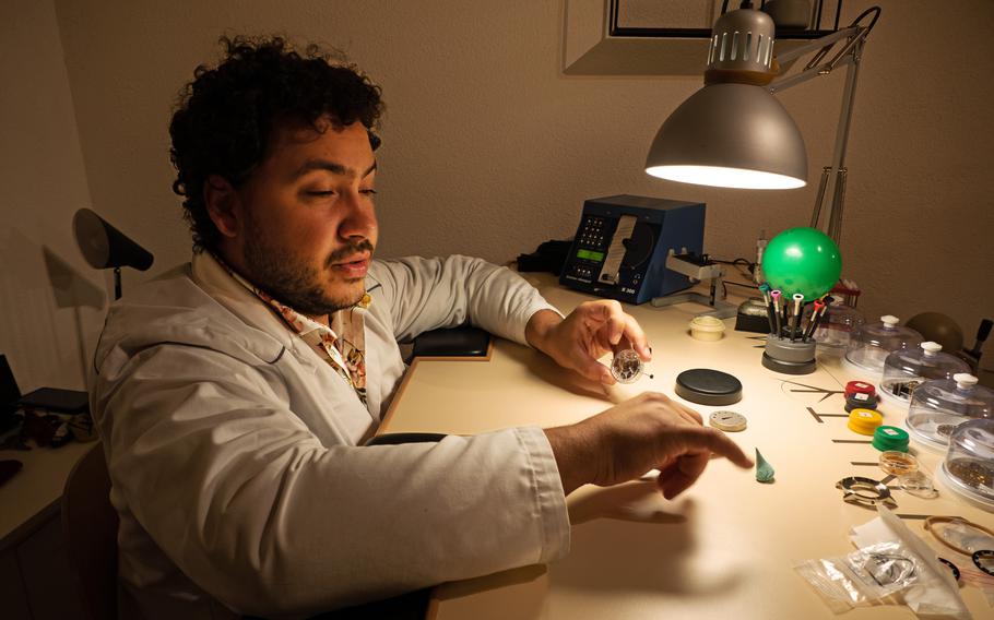 Initium’s Fabiano Pericles prepares to adjust a watch under assembly. 